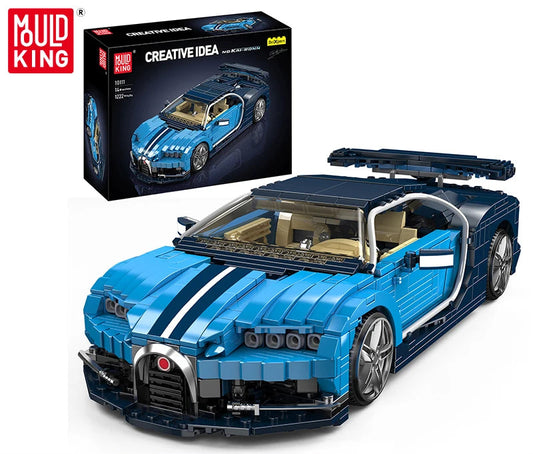 Blue toy car model with open roof and detailed interior, displayed in front of Mould King packaging.